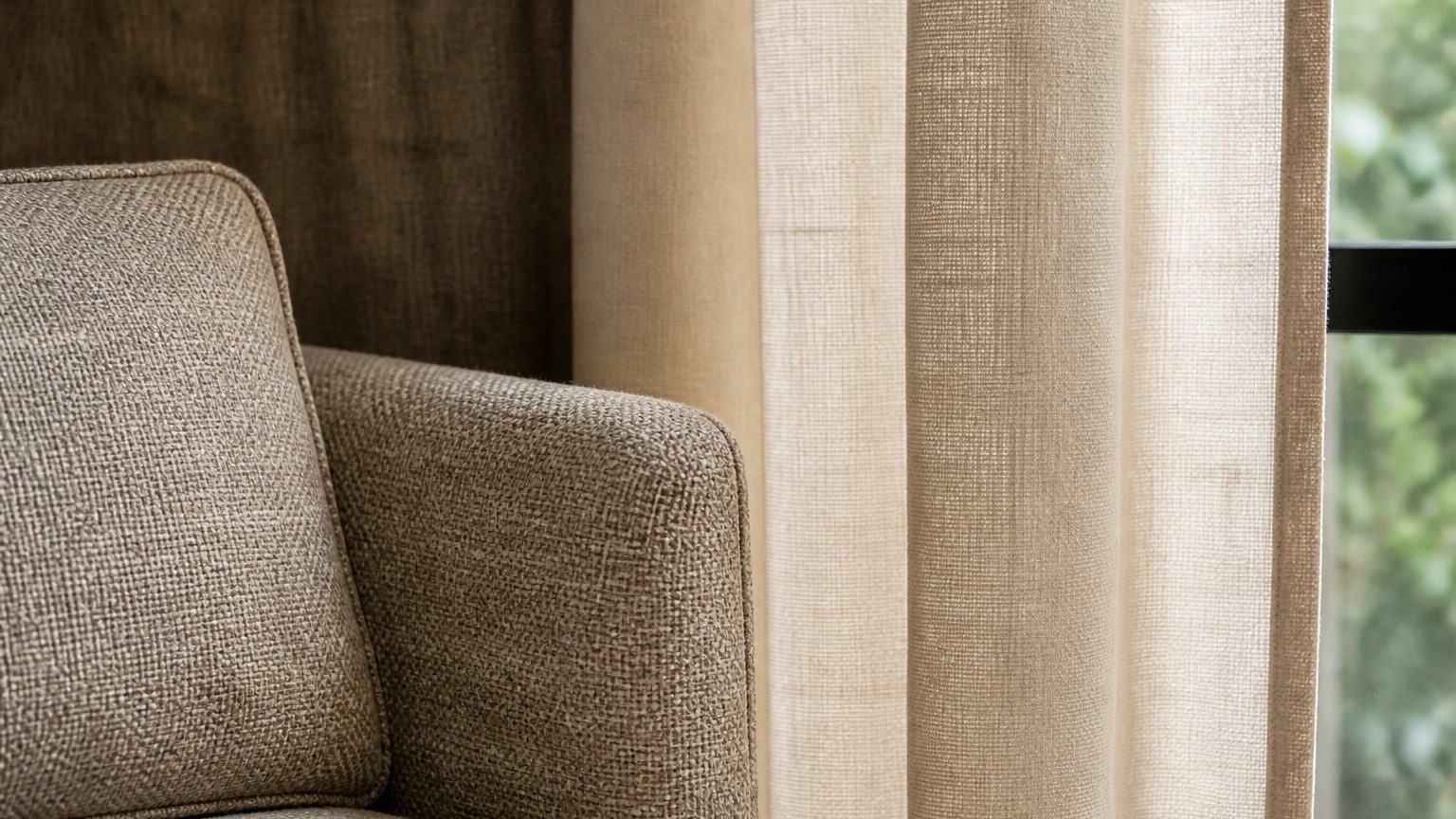 Close study of upholstery weave and a lined curtain in natural light