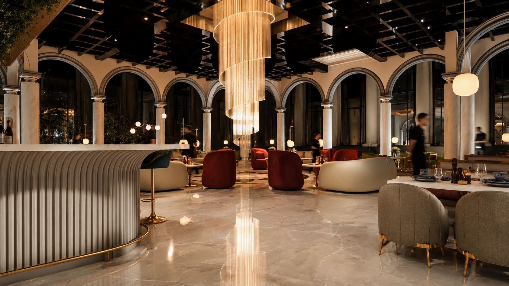 Arched colonnade and spiral chandelier above the lounge at ITC Lotus Pavillion